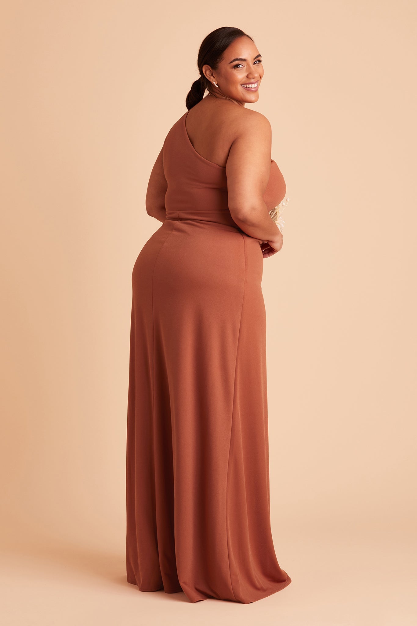 Kira plus size bridesmaid dress with slit in terracotta crepe by Birdy Grey, side view