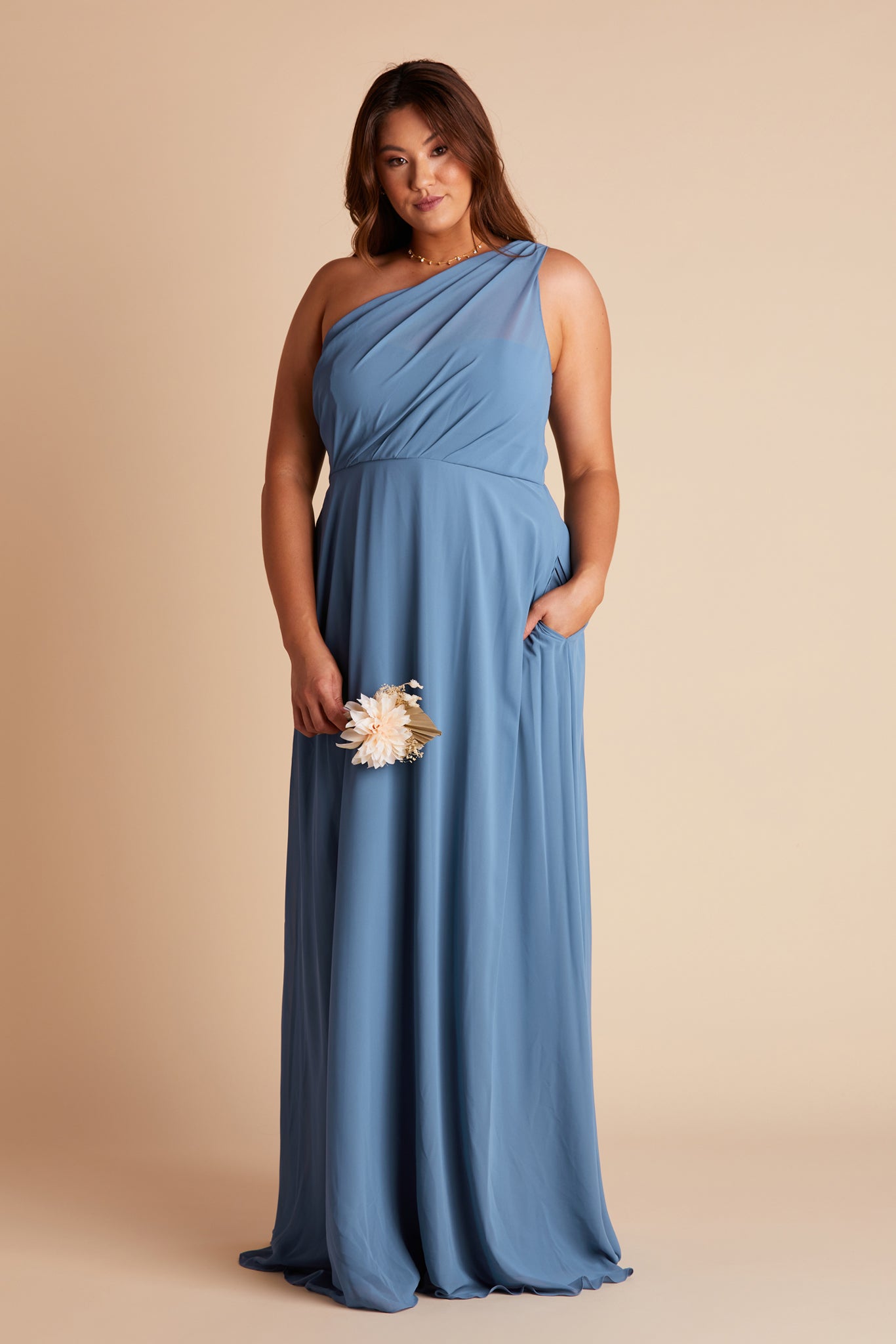 Kira plus size bridesmaids dress in twilight blue chiffon by Birdy Grey, front view with hand in pocket