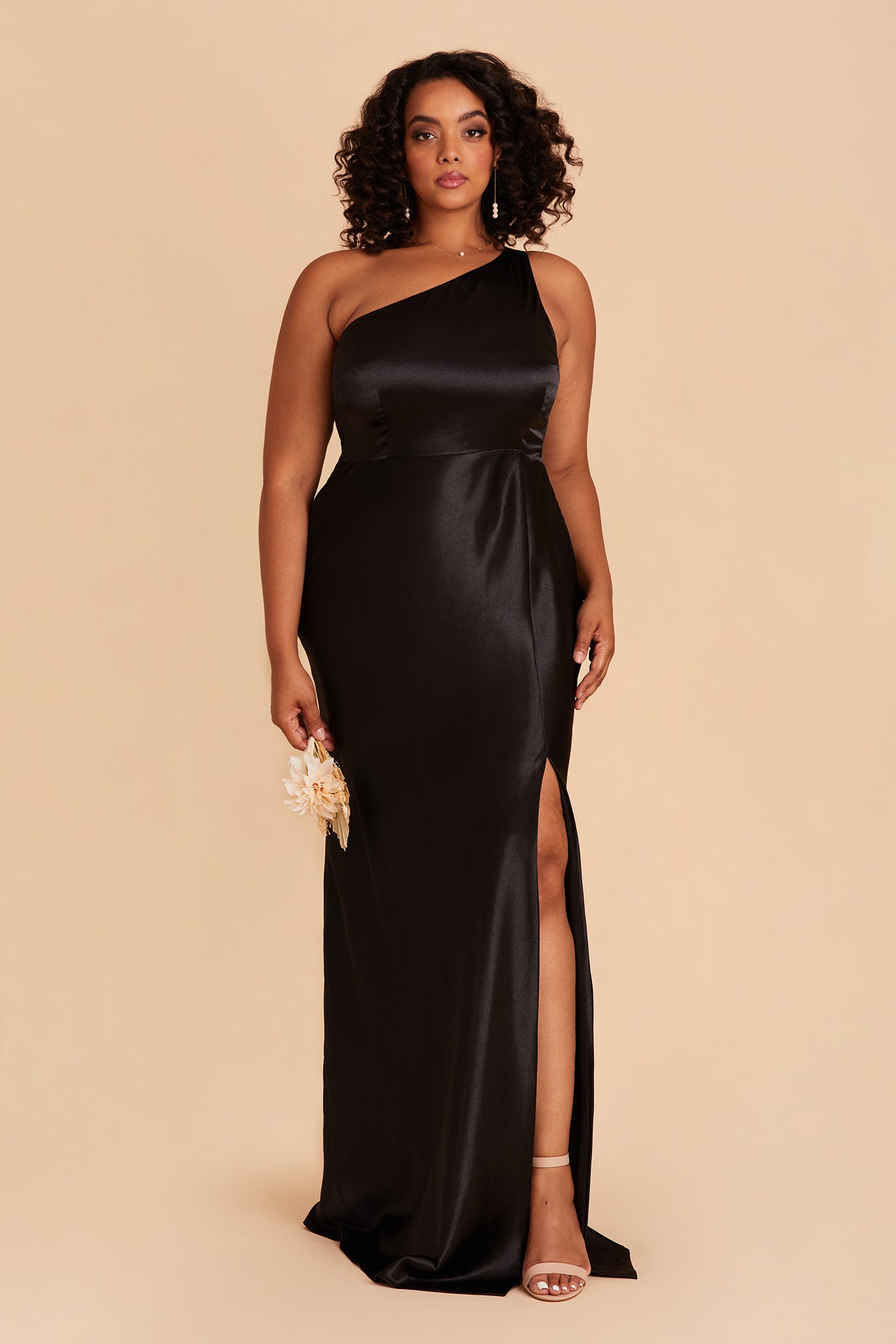 Kira plus size bridesmaid dress with slit in black satin by Birdy Grey, front view