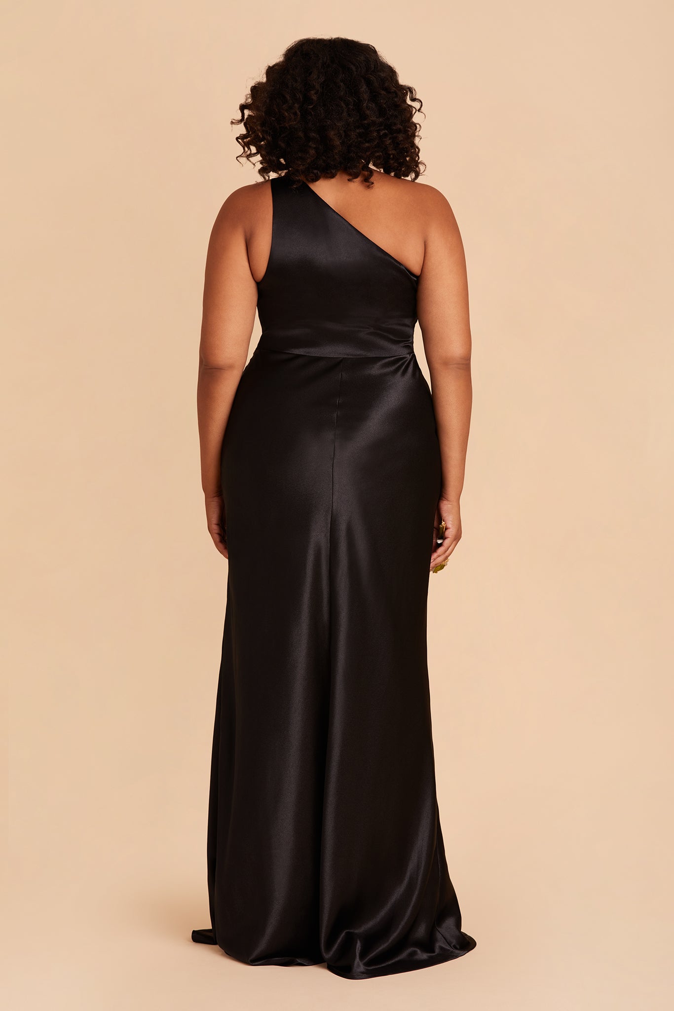 Kira plus size bridesmaid dress with slit in black satin by Birdy Grey, back view