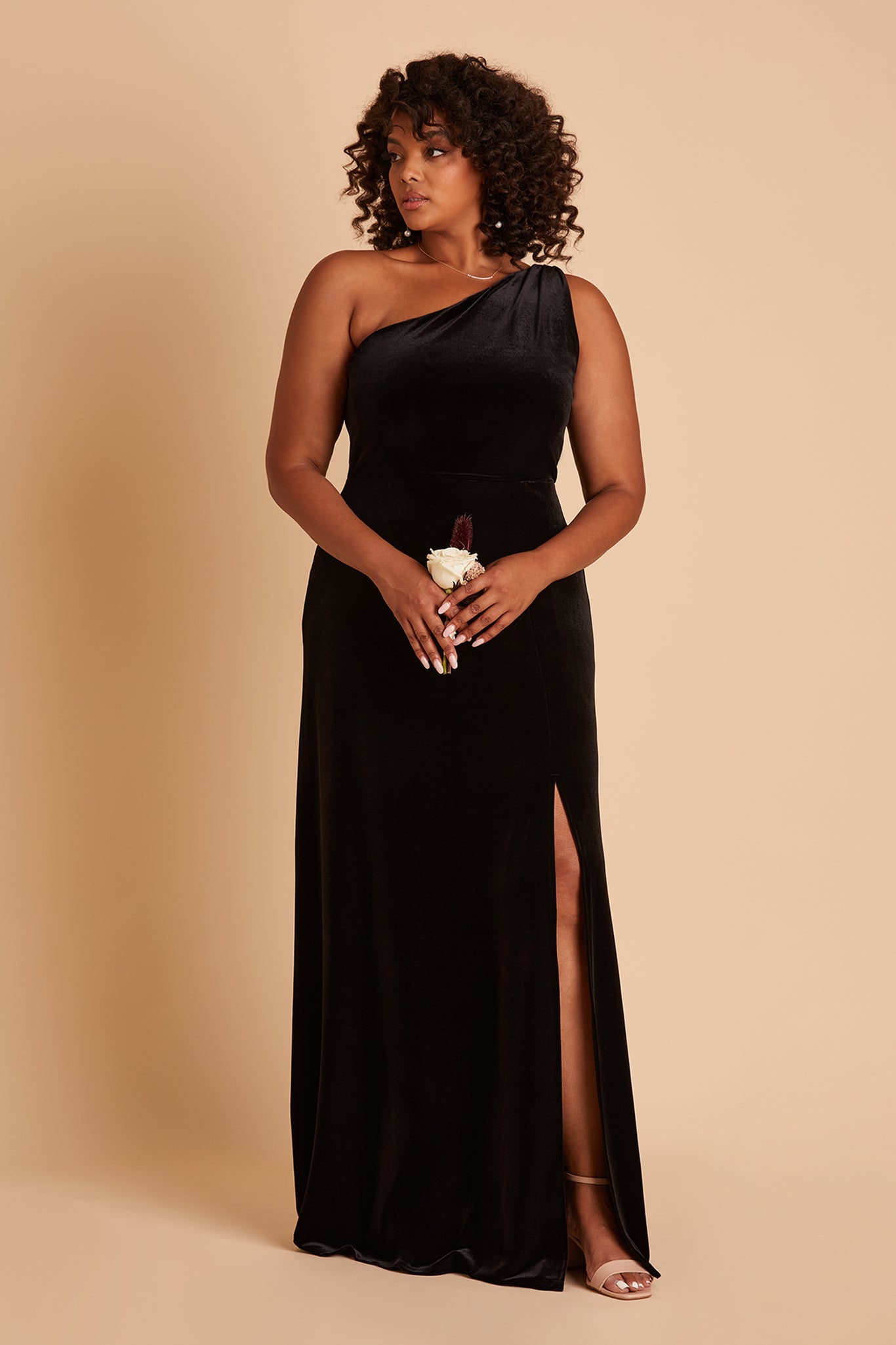 Kira plus size bridesmaid dress with slit in black velvet by Birdy Grey, front view