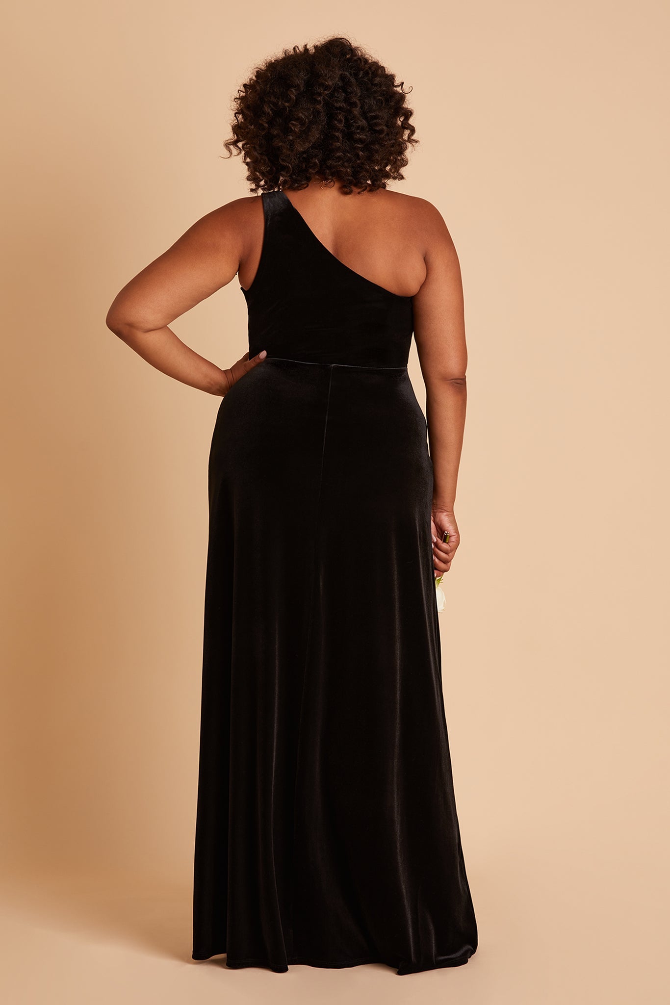 Kira plus size bridesmaid dress with slit in black velvet by Birdy Grey, back view