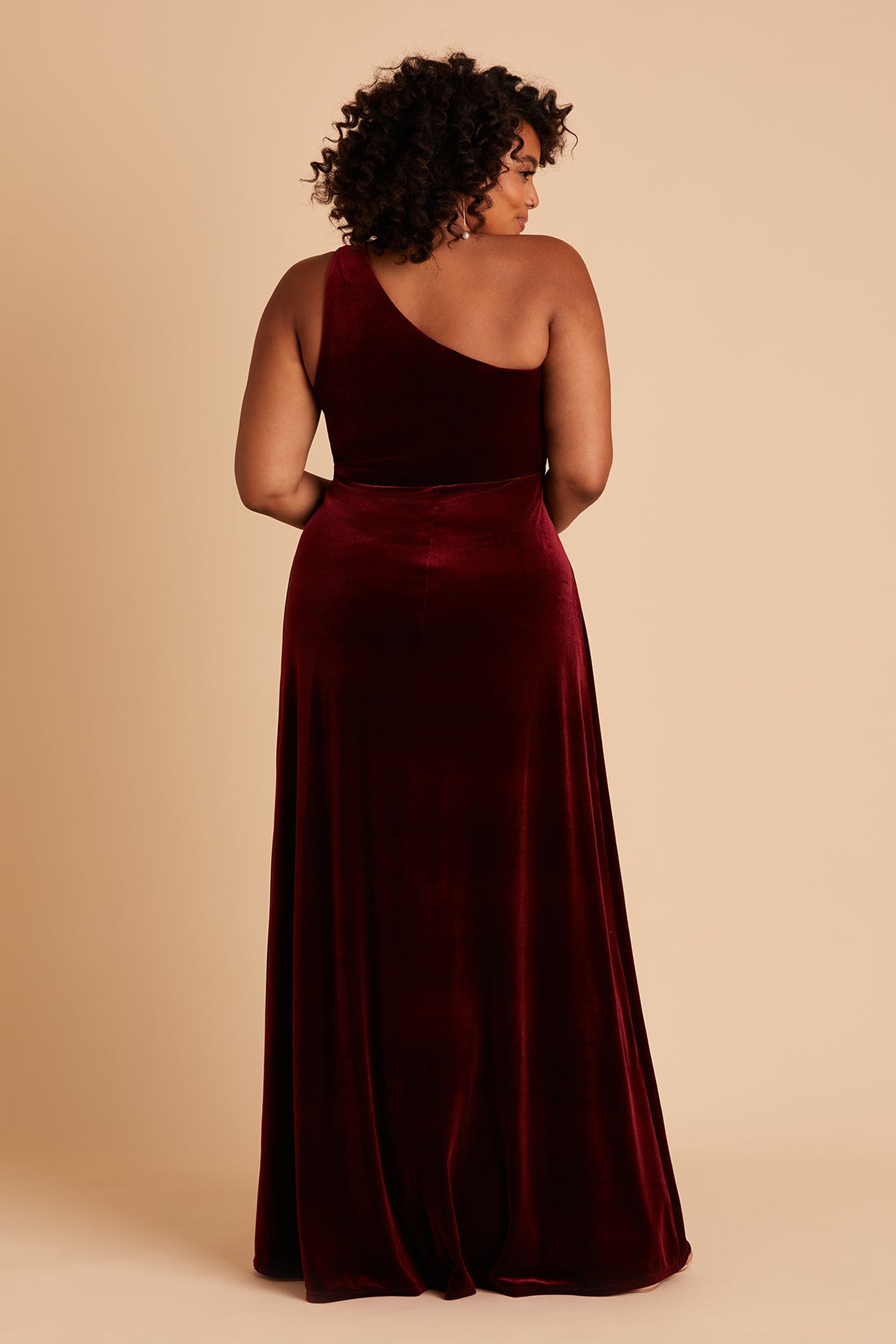Kira plus size bridesmaid dress with slit in cabernet velvet by Birdy Grey, back view