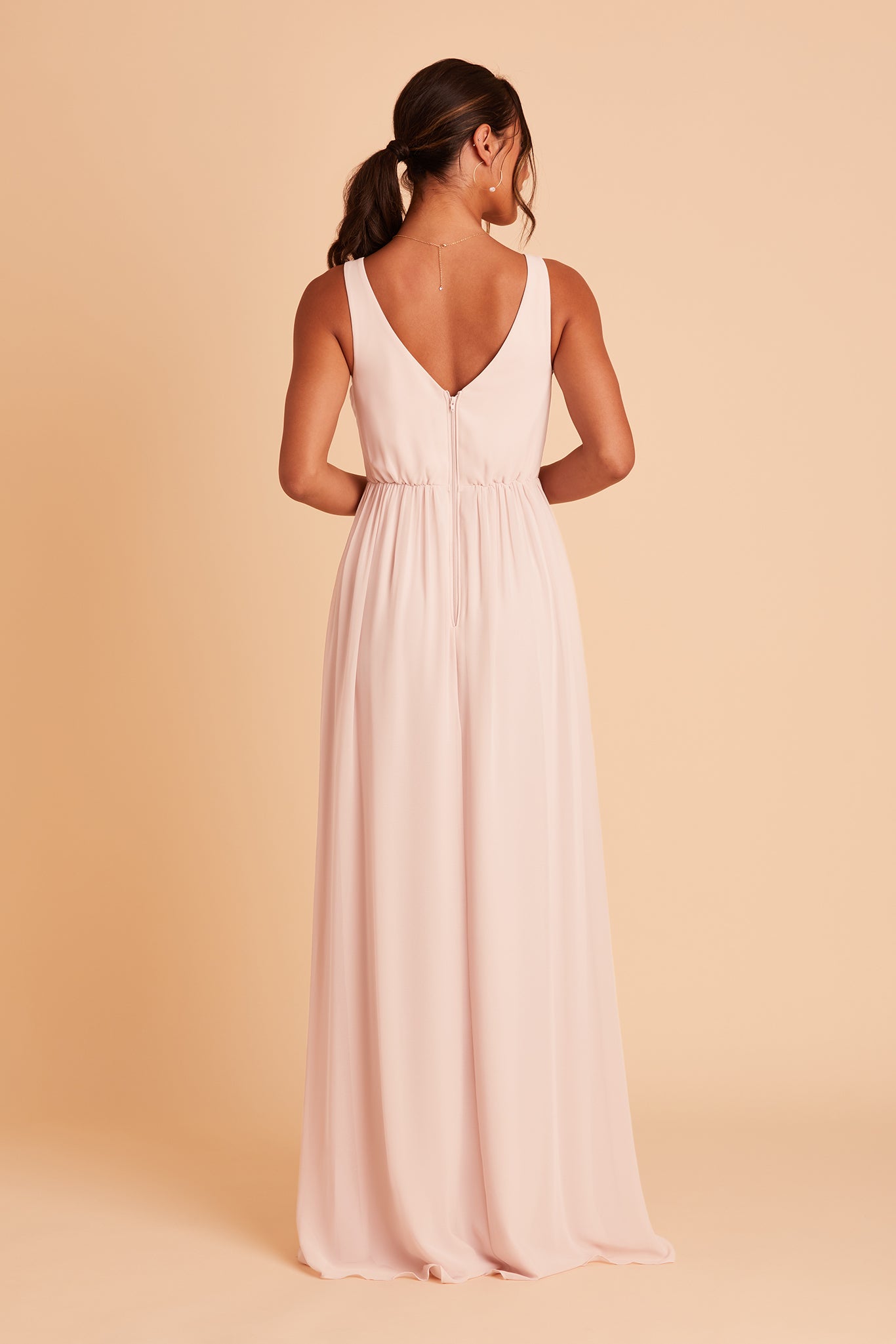 Laurie Empire bridesmaid dress with slit in pale blush chiffon by Birdy Grey, back view