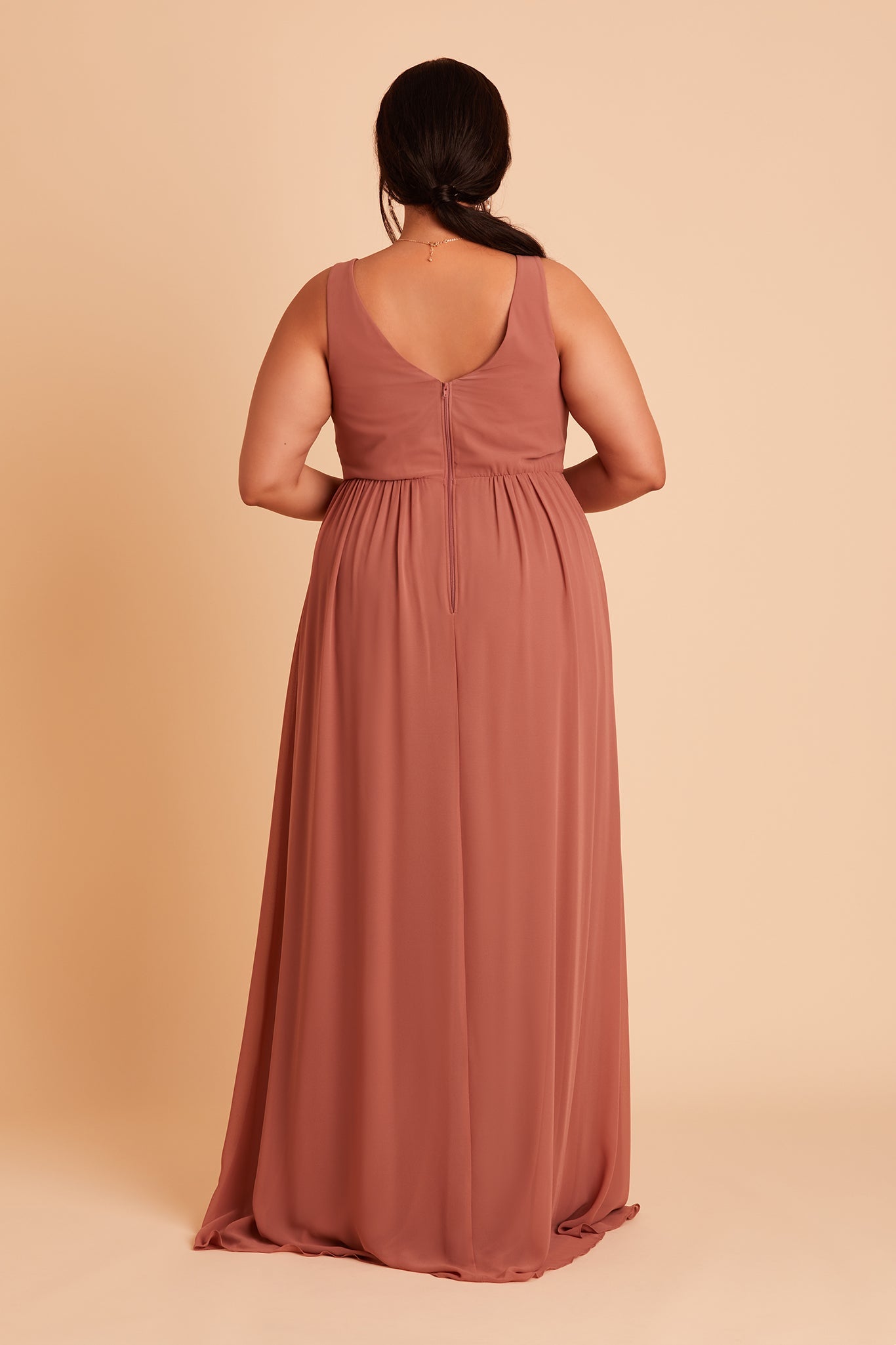 Laurie Empire plus size maternity bridesmaid dress with slit in desert rose chiffon by Birdy Grey, back view