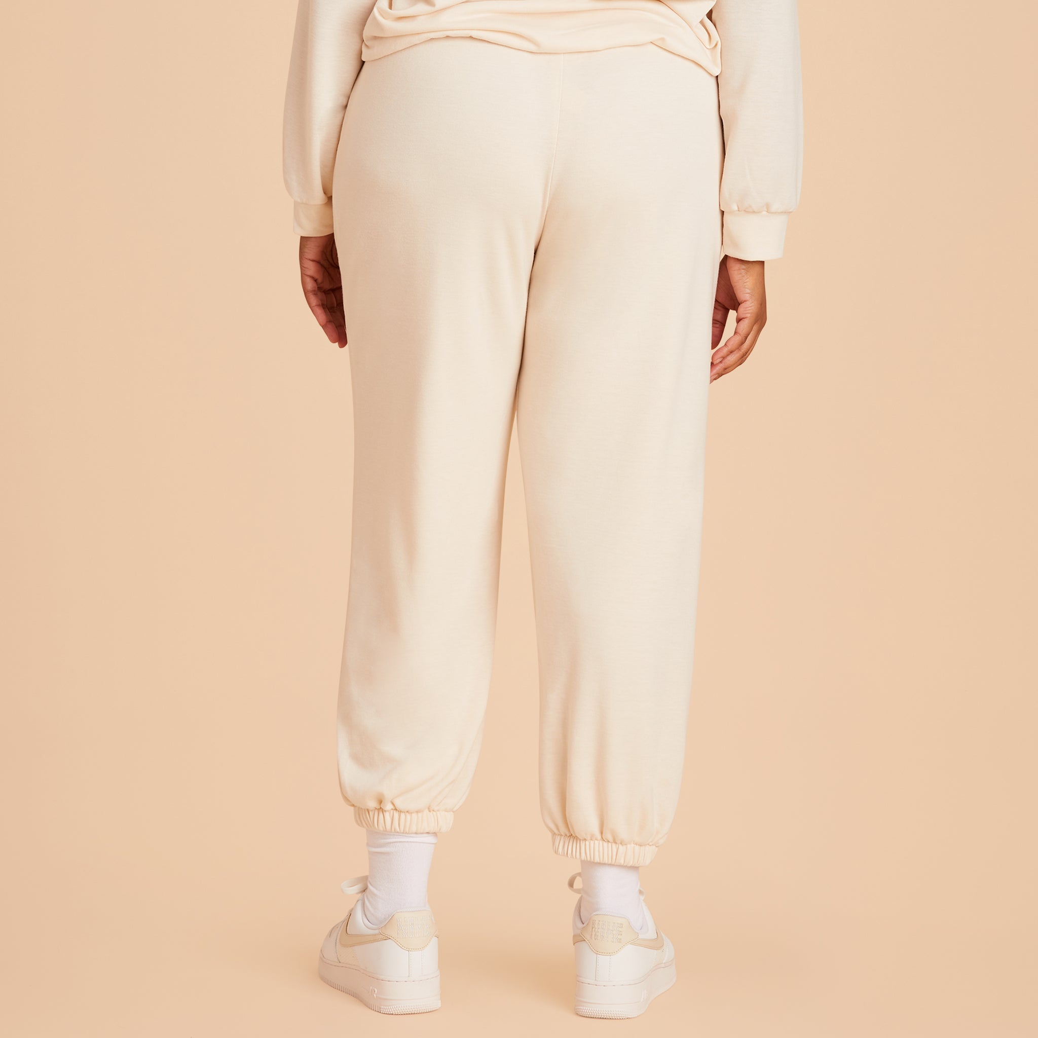 Plus Size Monogram sweatpants in vanilla cream back view