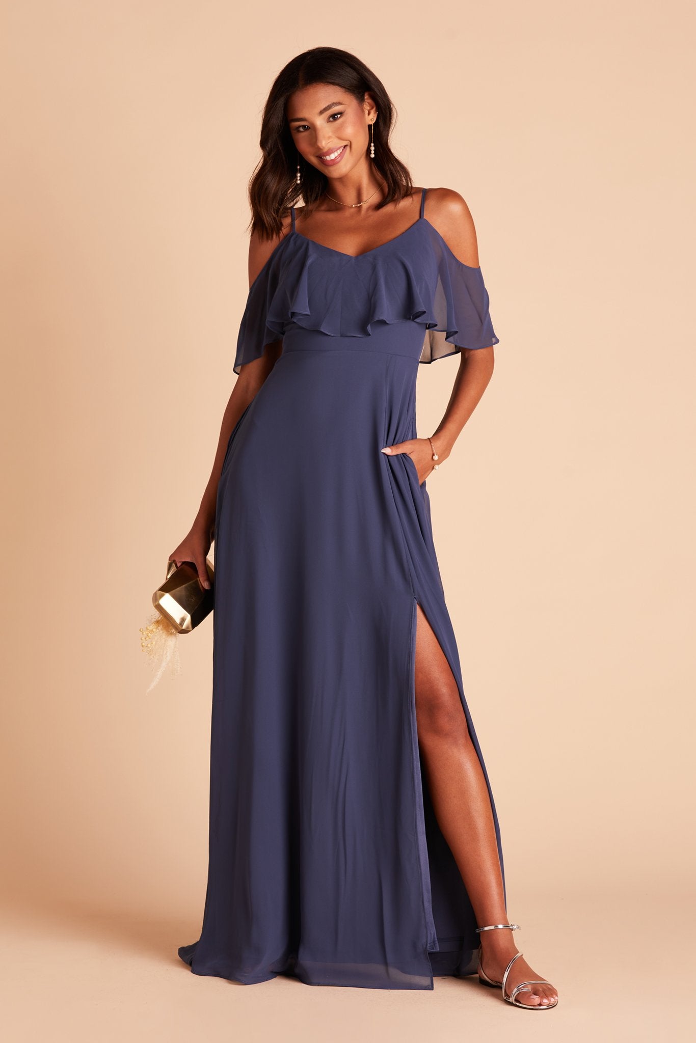 Jane convertible bridesmaid dress with slit in slate blue chiffon by Birdy Grey, front view with hand in pocket
