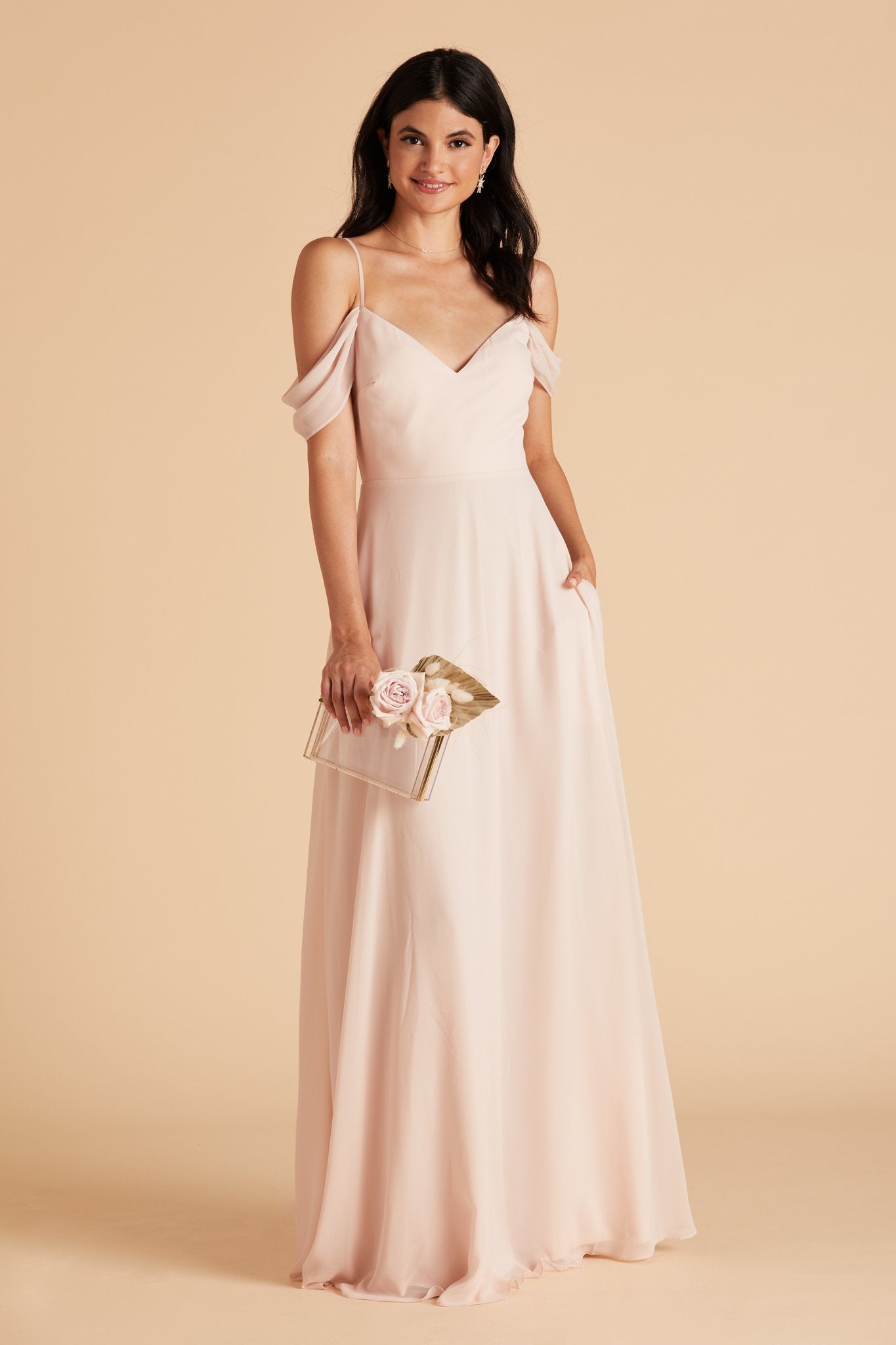 Devin convertible bridesmaids dress in pale blush chiffon by Birdy Grey, front view with hand in pocket
