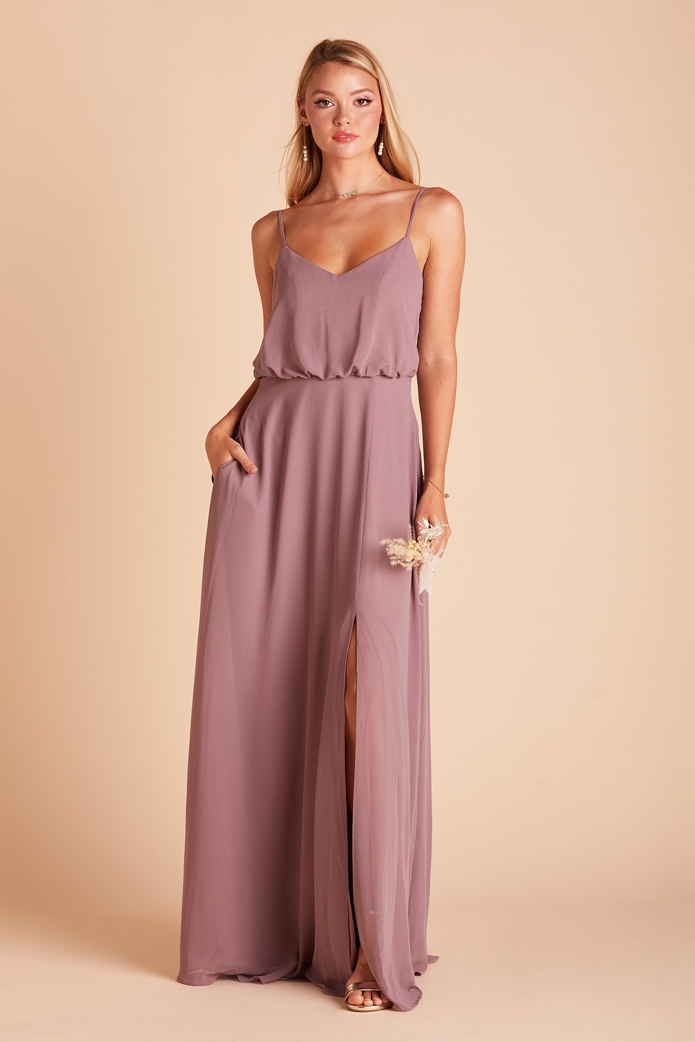 Gwennie bridesmaid dress with slit in dark mauve chiffon by Birdy Grey, front view with hand in pocket