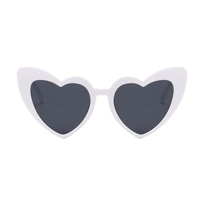 Front view of the Heart Sunglasses by Birdy Grey in white with a black lens. The retro style features a flirty and fun high-pointed cat-eye heart shape frame.