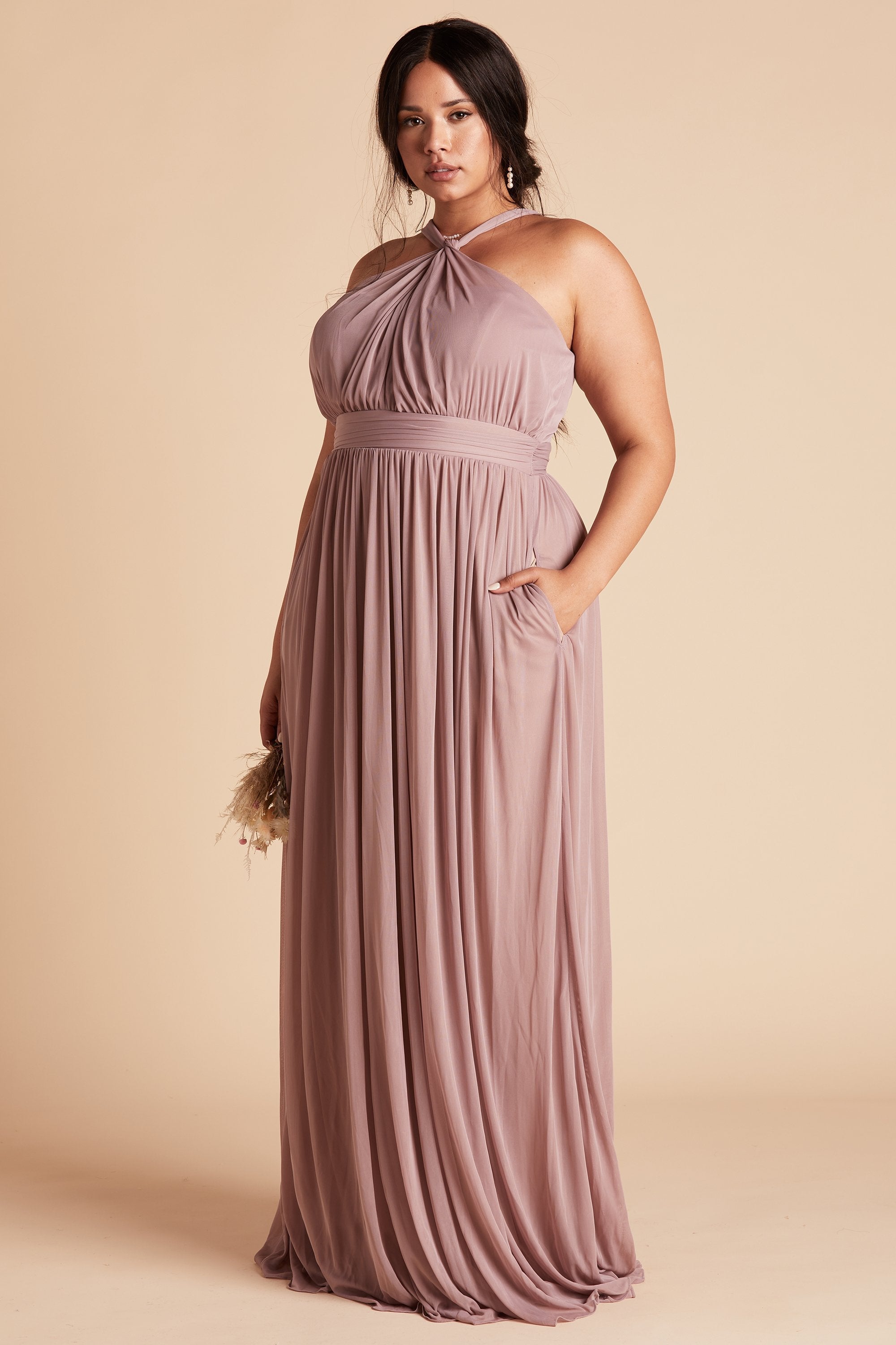 Kiko plus size bridesmaid dress in mauve pink chiffon by Birdy Grey, front view with hand in pocket