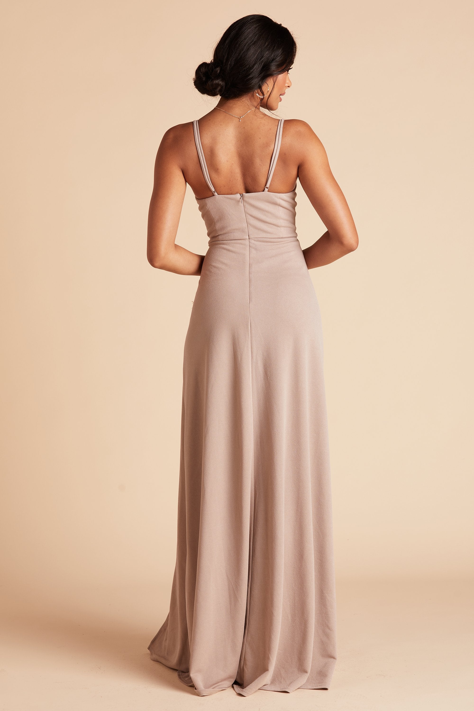 Back view of the Ash Bridesmaid Dress in taupe crepe shows skinny adjustable straps as well as an open back just below shoulder blades.