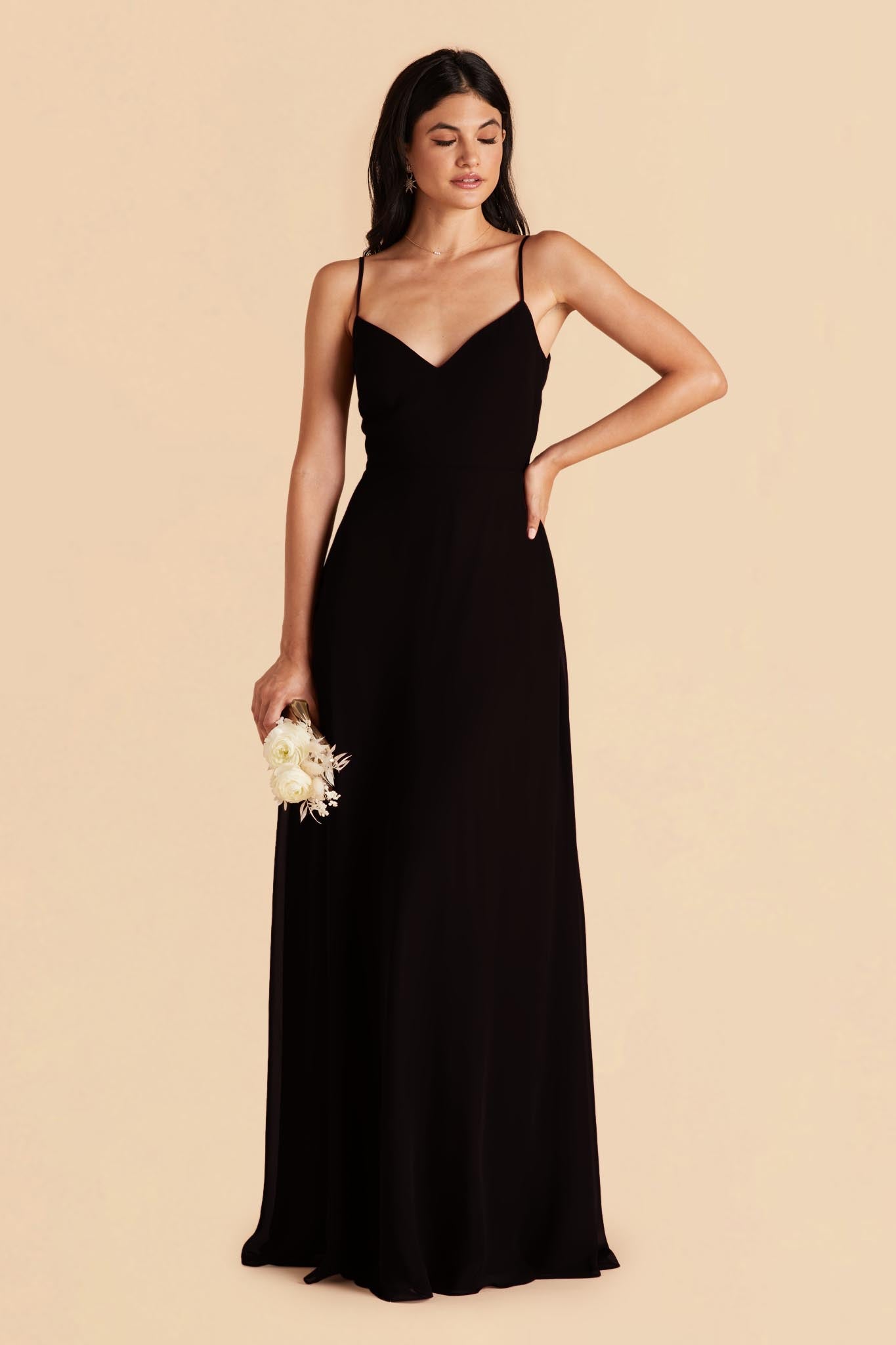 Long floor-sweeping black chiffon bridesmaid dress with a V-neckline no sleeves