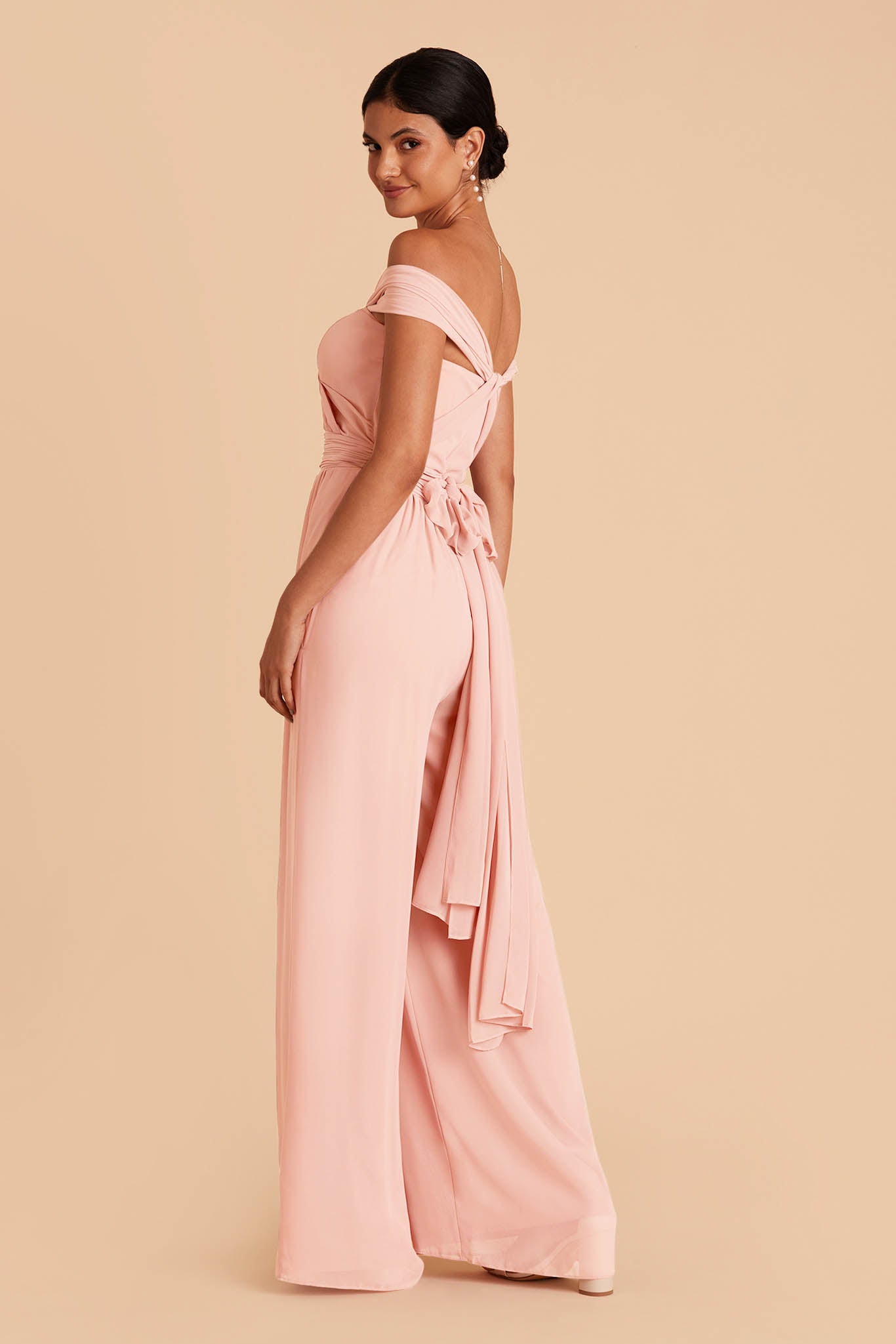 light pink  wedding jumpsuit with sweetheart bodice with convertible neckline with tie in the back