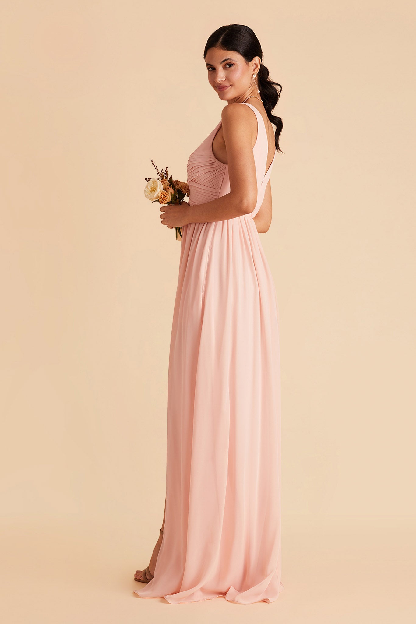 Laurie Empire maternity bridesmaid dress with slit in blush pink by Birdy Grey, side view