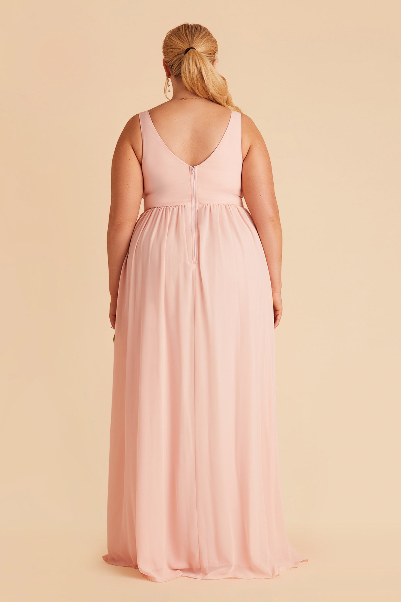 Laurie Empire plus size maternity bridesmaid dress with slit blush pink by Birdy Grey, back view