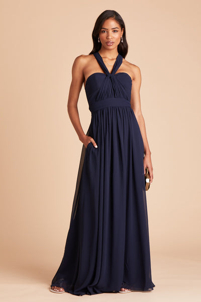 Grace convertible bridesmaid dress in navy blue chiffon by Birdy Grey, front view with hand in pocket