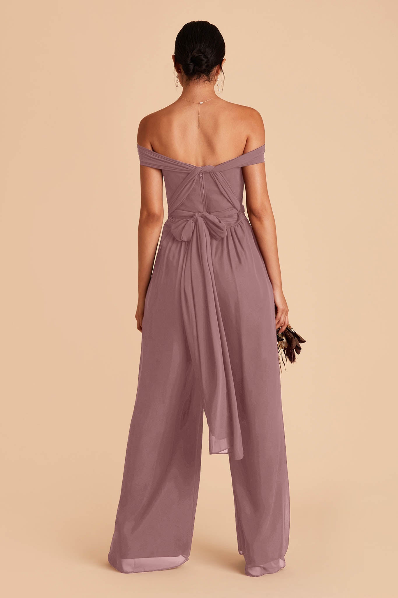 medium purple wedding jumpsuit with convertible neckline and tie with a bow in the back