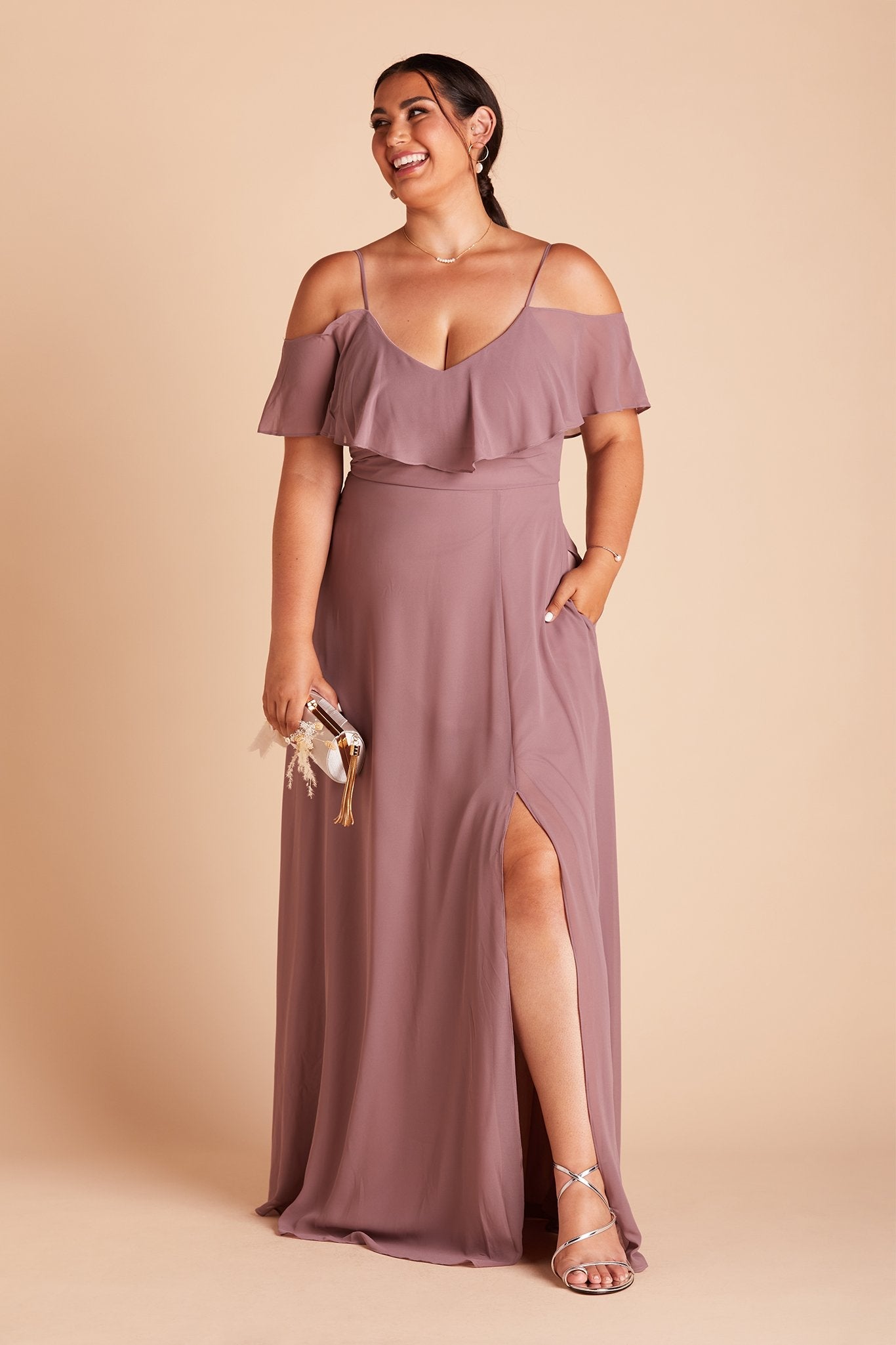 Jane convertible plus size bridesmaid dress with slit in dark mauve chiffon by Birdy Grey, front view with hand in pocket
