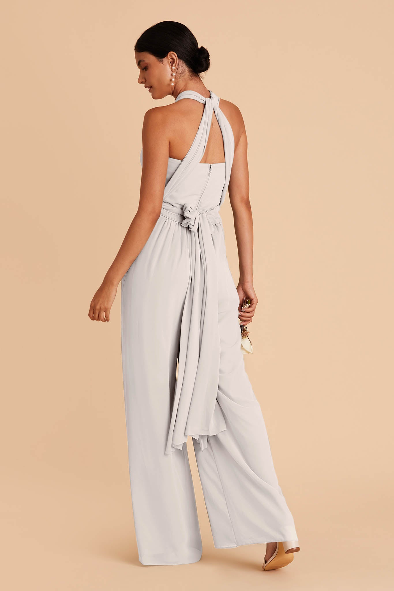 Light gray wedding jumpsuit with sweetheart bodice with convertible neckline with tie in the back