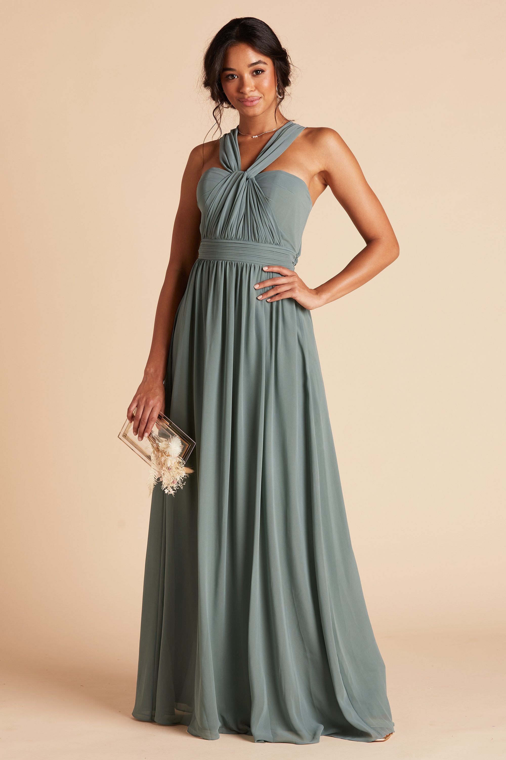 Front view of Grace Convertible Dress in sea glass chiffon worn by a slender model with a medium skin tone. Front streamers are tied at the center of the sweetheart neckline, then pulled back over each shoulder to form an x-neckline.