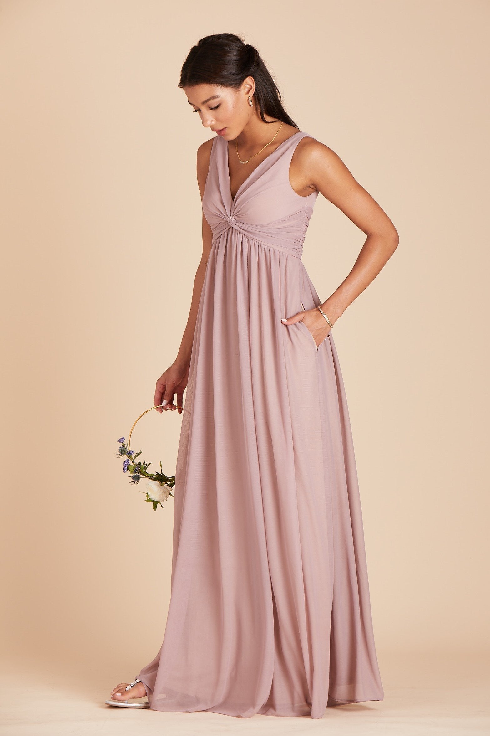 Lianna bridesmaid dress in mauve pink chiffon by Birdy Grey, front view with hand in pocket