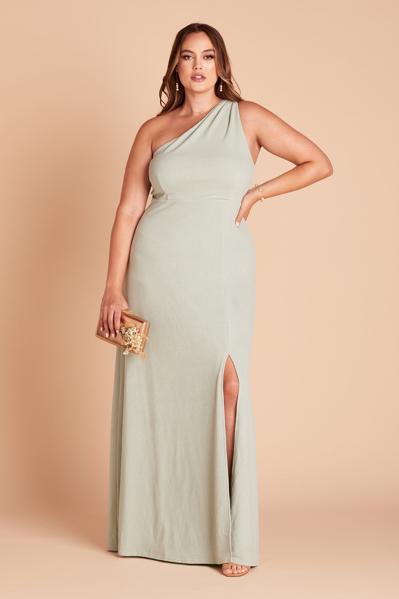 Kira plus size bridesmaid dress with slit in sage green crepe by Birdy Grey, front view
