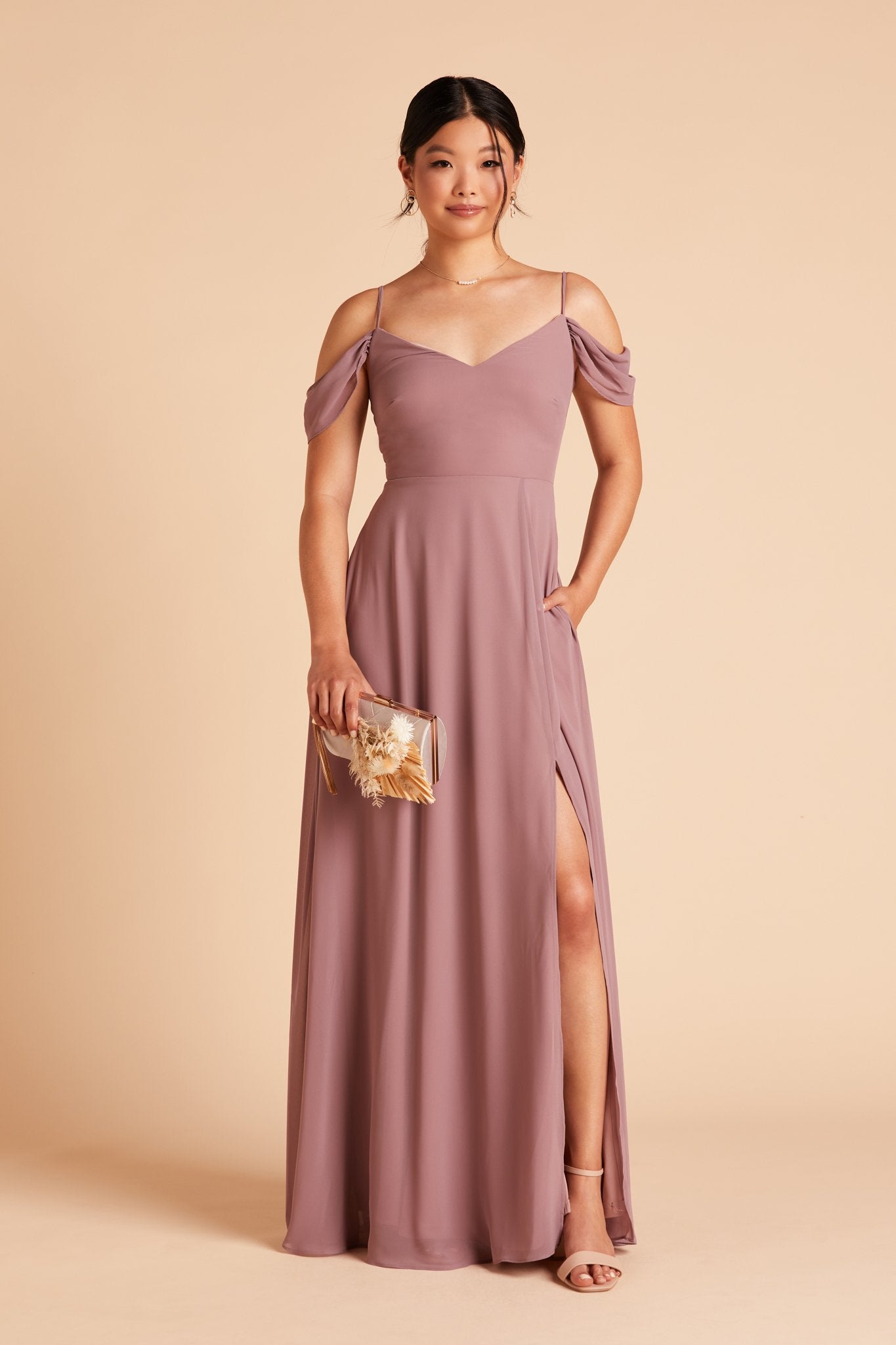 Devin convertible bridesmaid dress with slit in dark mauve chiffon by Birdy Grey, front view with hand in pocket