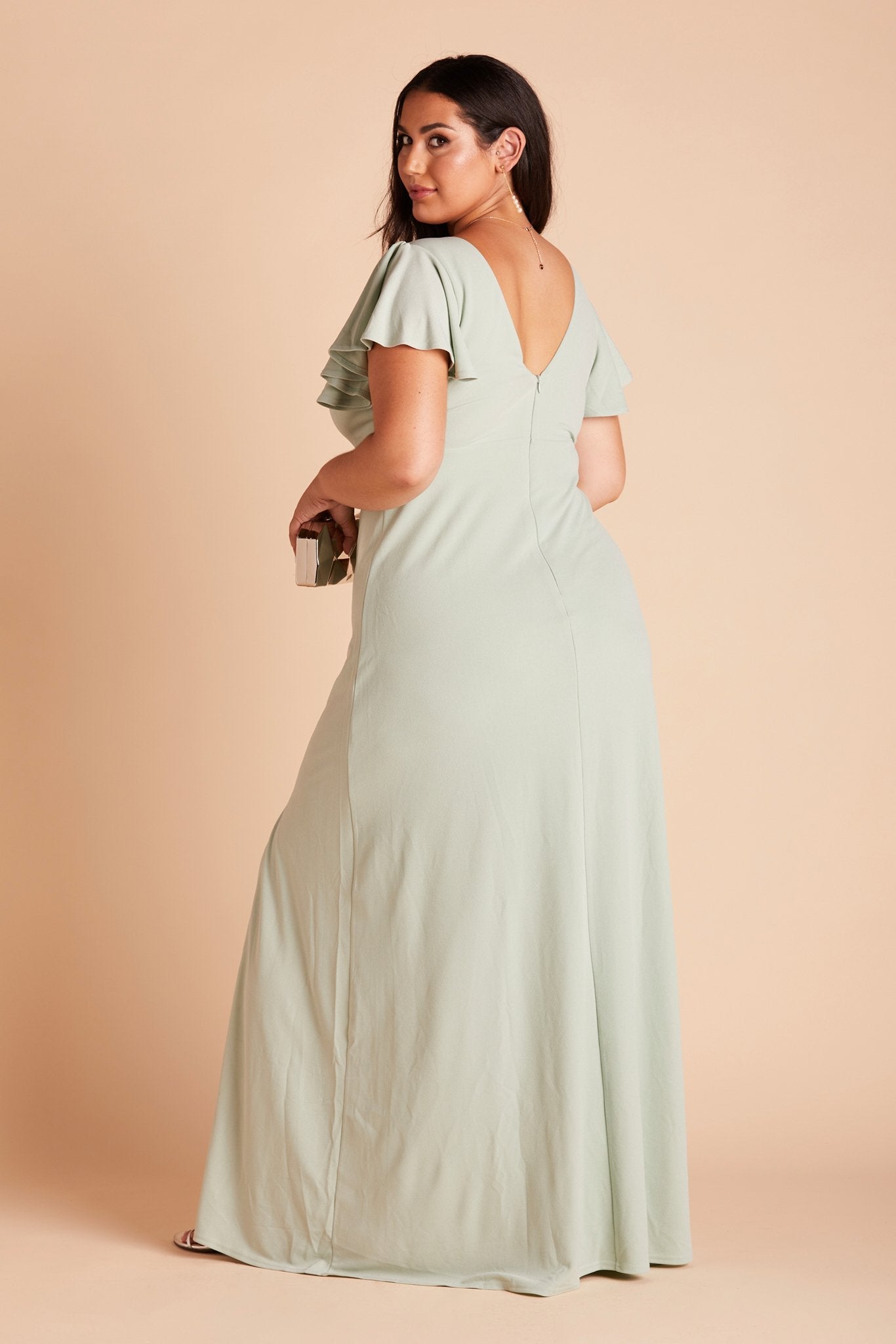 Hannah plus size bridesmaid dress with slit in sage green crepe by Birdy Grey, side view
