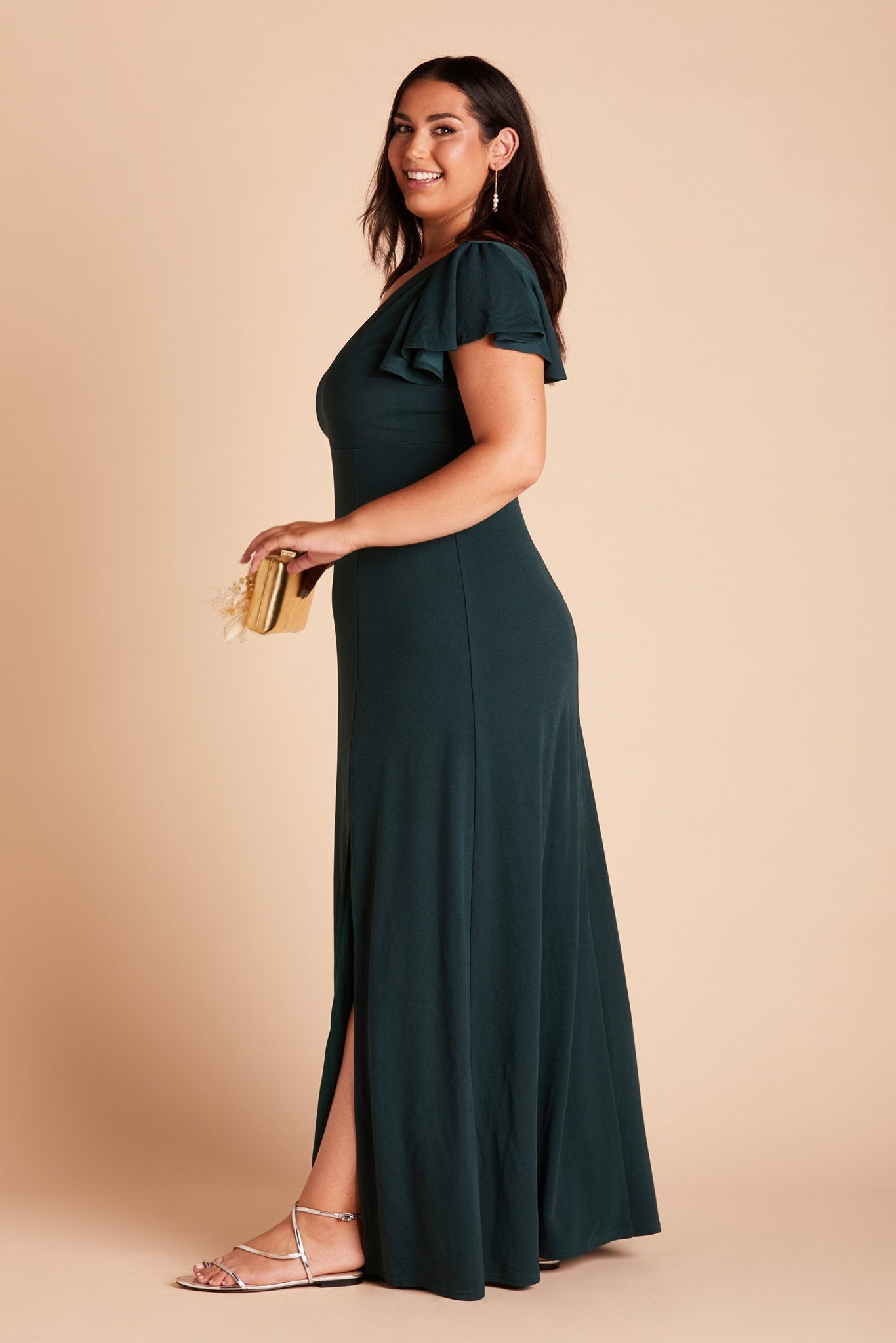 Hannah plus size bridesmaid dress with slit in emerald green crepe by Birdy Grey, side view
