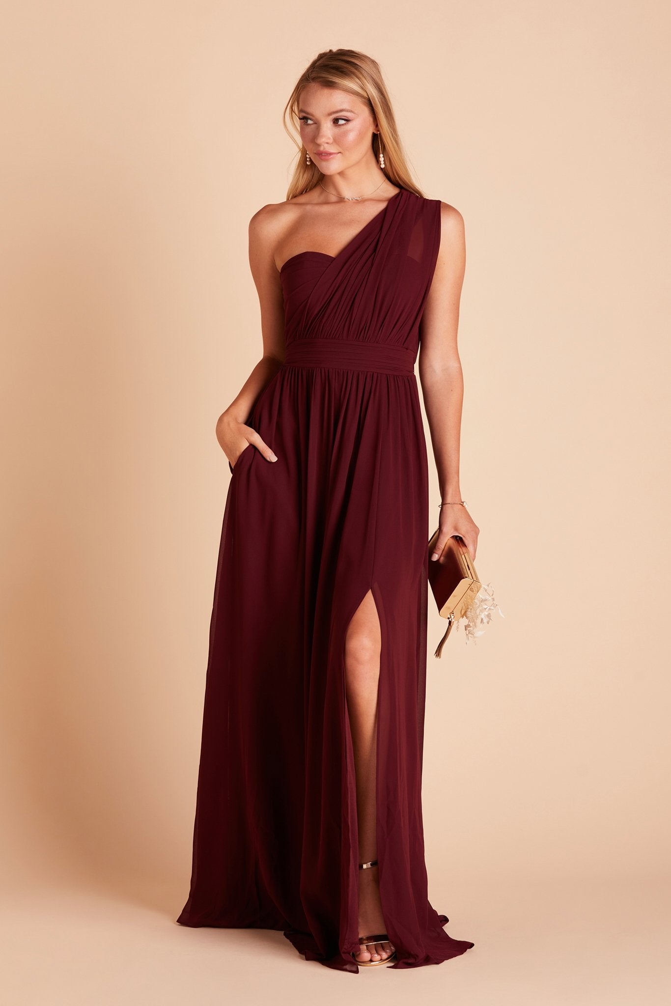 Grace convertible bridesmaid dress with slit in cabernet burgundy chiffon by Birdy Grey, front view with hand in pocket