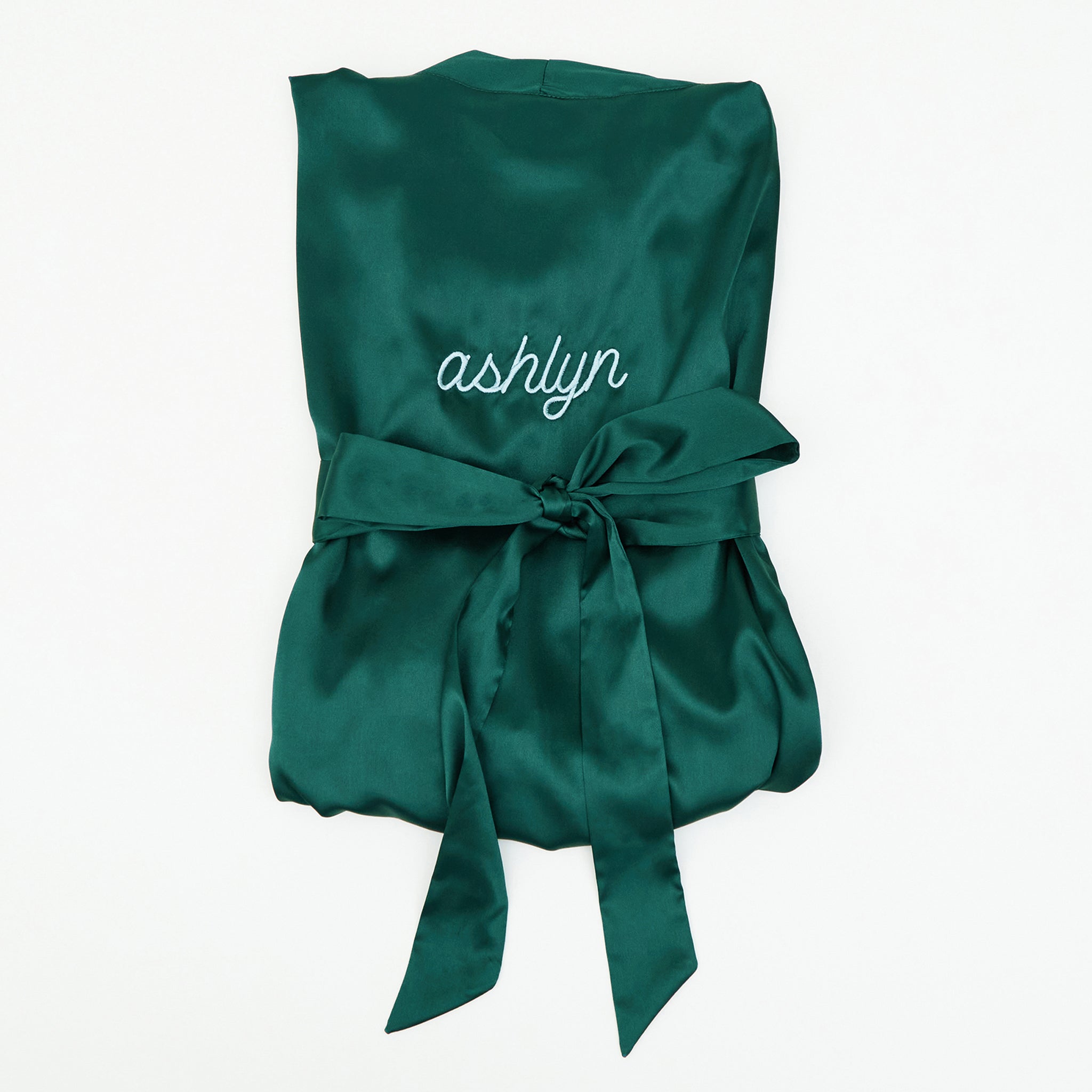 Emerald Claudine satin lace robes, flatlay