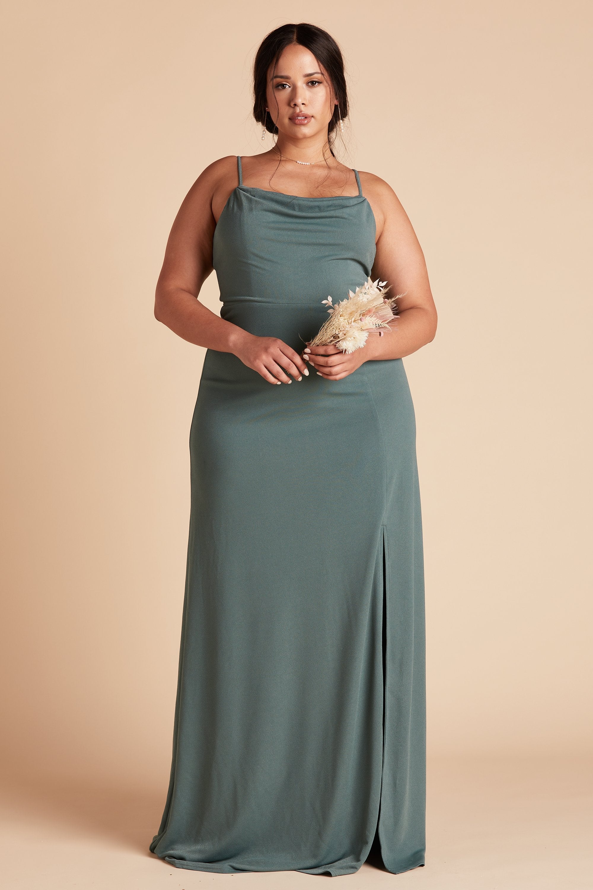 Front view of the floor-length Ash Plus Size Bridesmaid Dress in sea glass crepe worn by a curvy model with medium-tone skin.