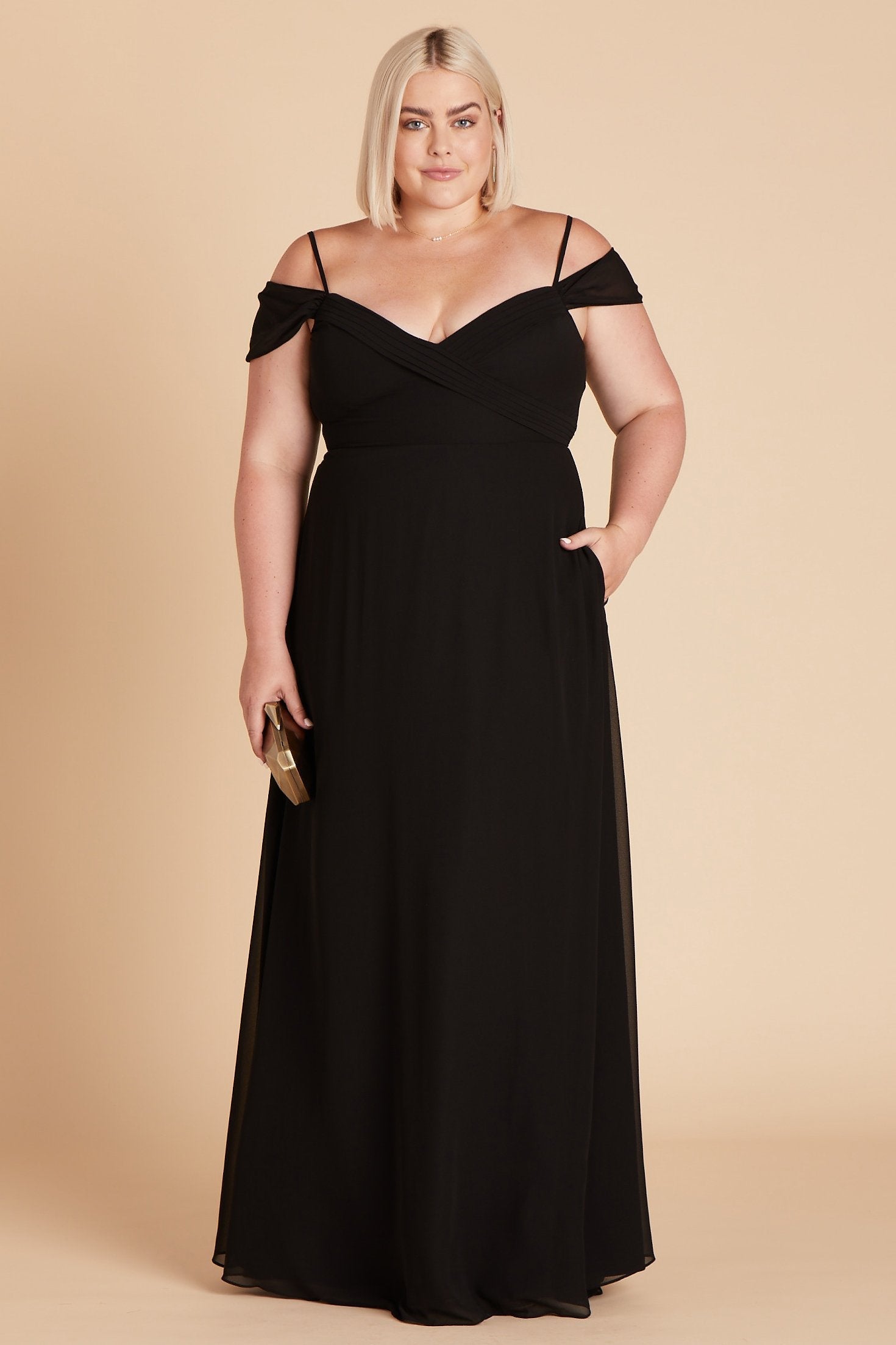 Spence convertible plus size bridesmaid dress in black chiffon by Birdy Grey, front view with hand in pocket 