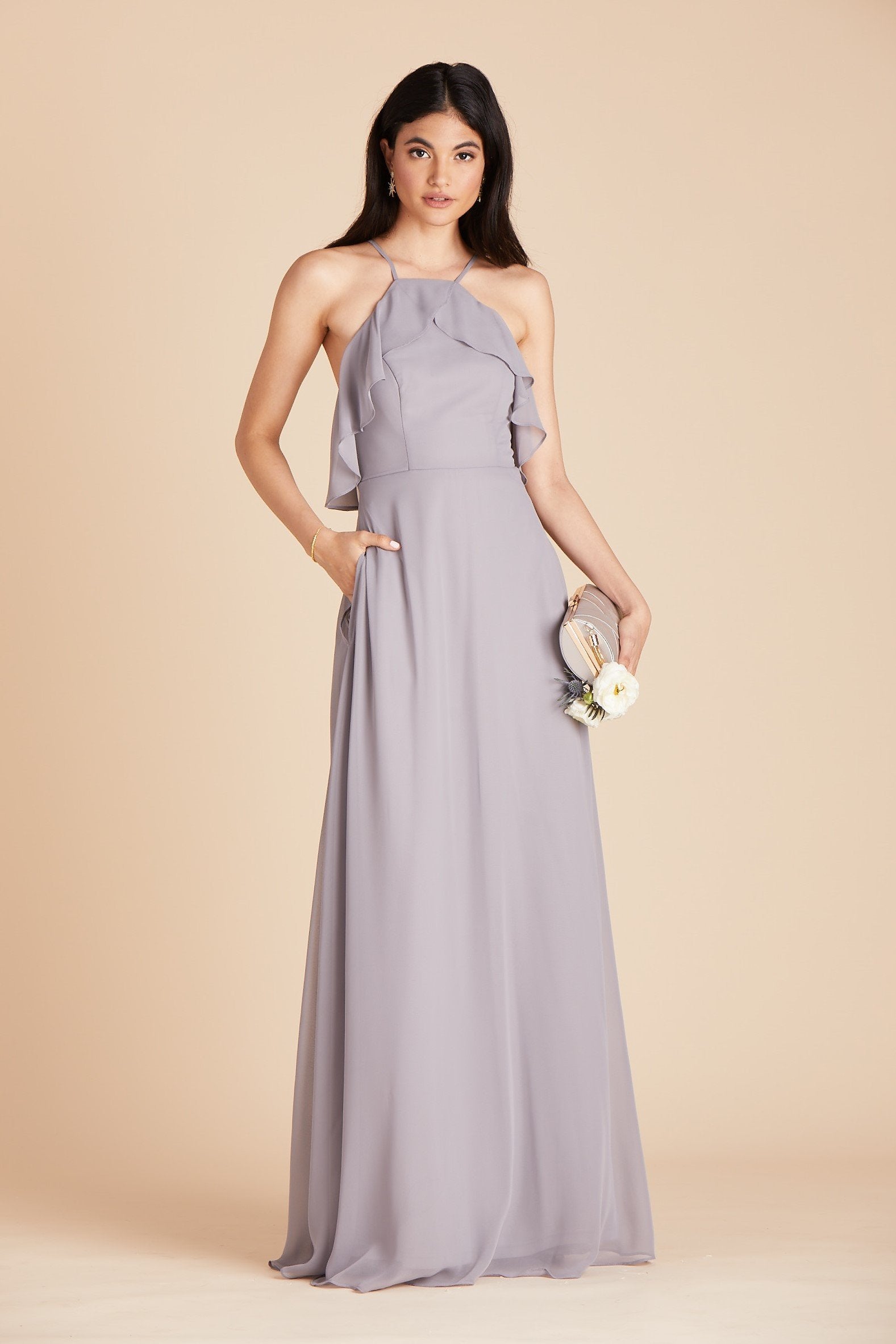 Jules bridesmaid dress in silver chiffon by Birdy Grey, front view with hand in pocket