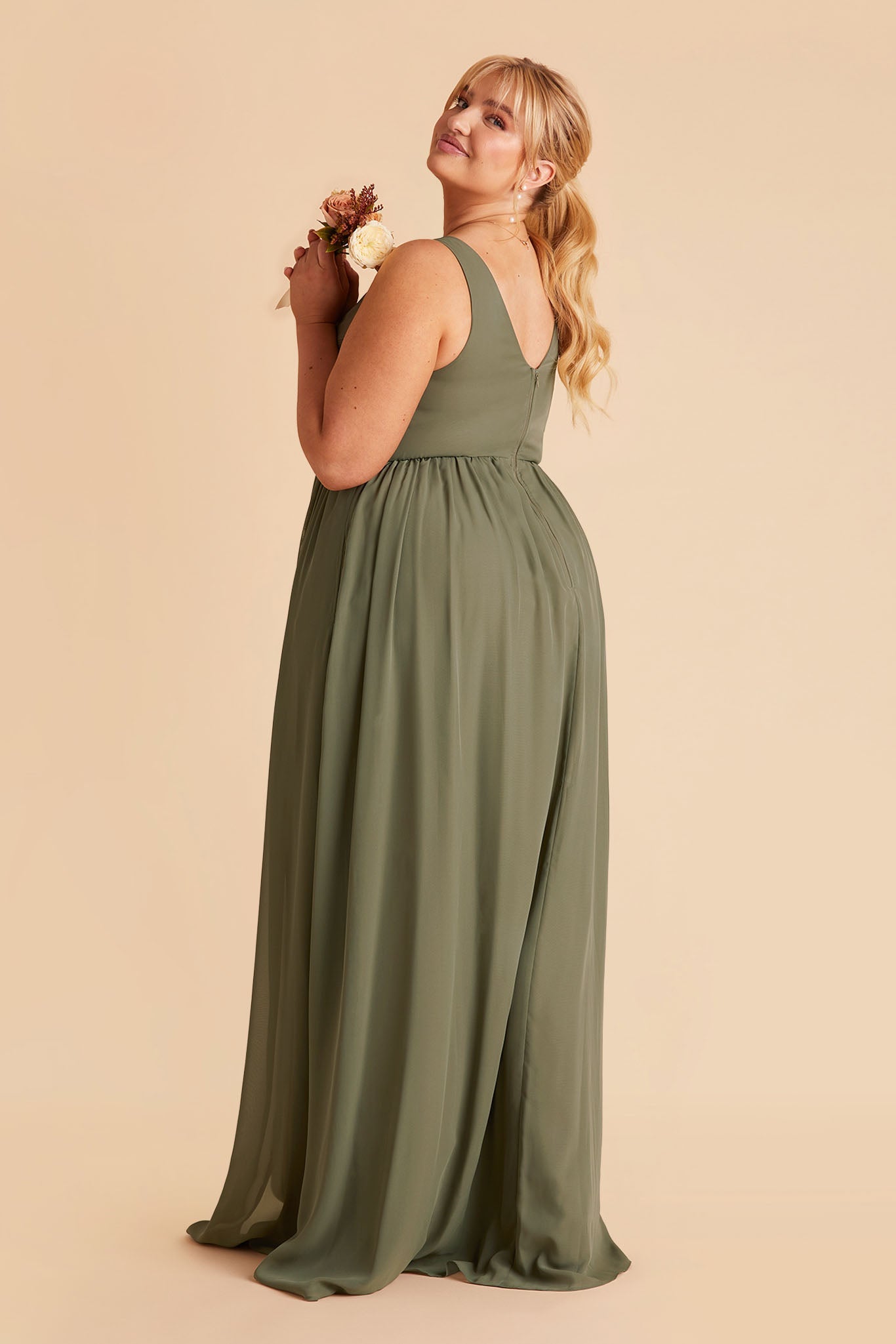 Laurie Empire plus size maternity bridesmaid dress with slit in moss green by Birdy Grey, side view
