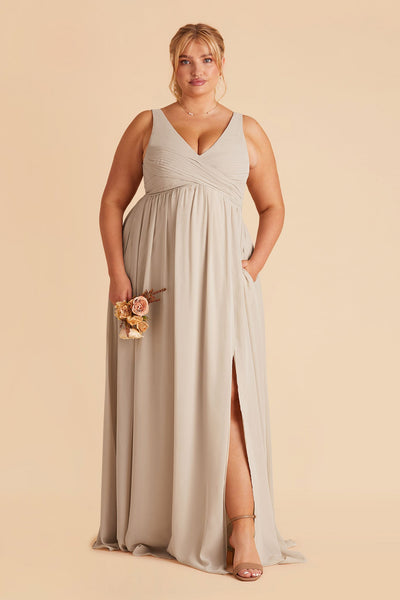 Laurie Empire plus size maternity bridesmaid dress with slit in neutral champagne by Birdy Grey, front view