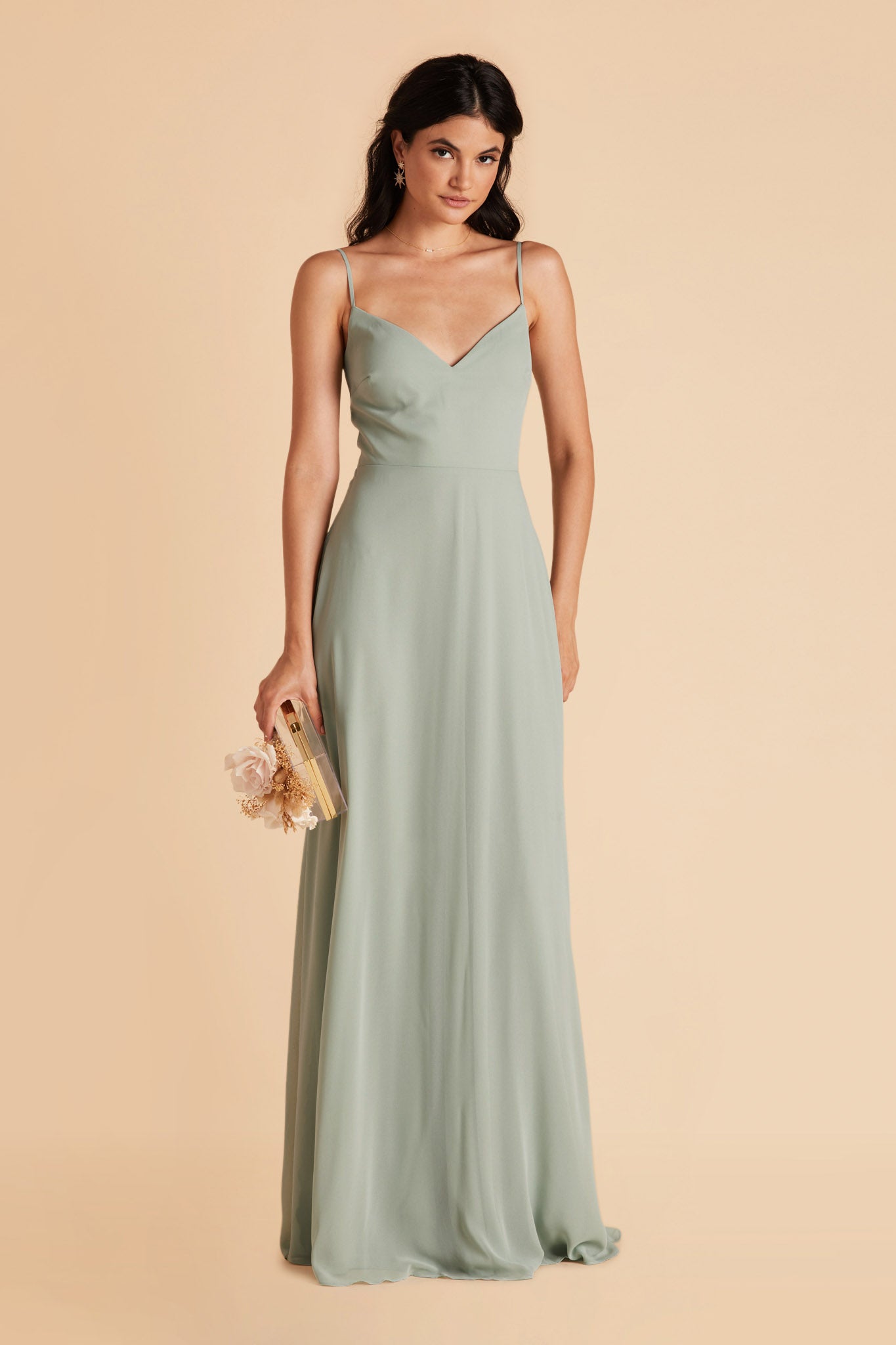 Front view of the floor-length Devin Convertible Bridesmaid Dress in sage chiffon with a V-neck front. The flowing skirt has no slit, as this is an optional feature.