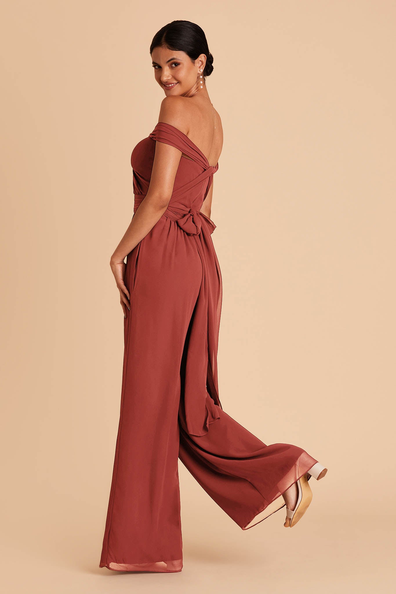 Reddish orange color wedding jumpsuit with sweetheart bodice with convertible neckline tie in the back