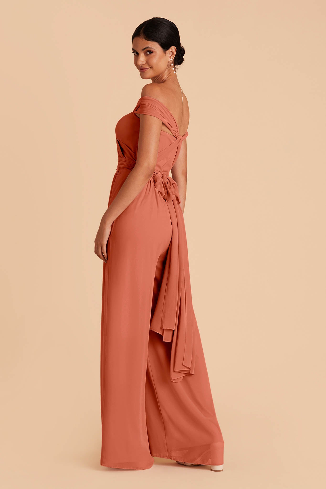 Light orange wedding jumpsuit with sweetheart bodice with convertible neckline tie in the back