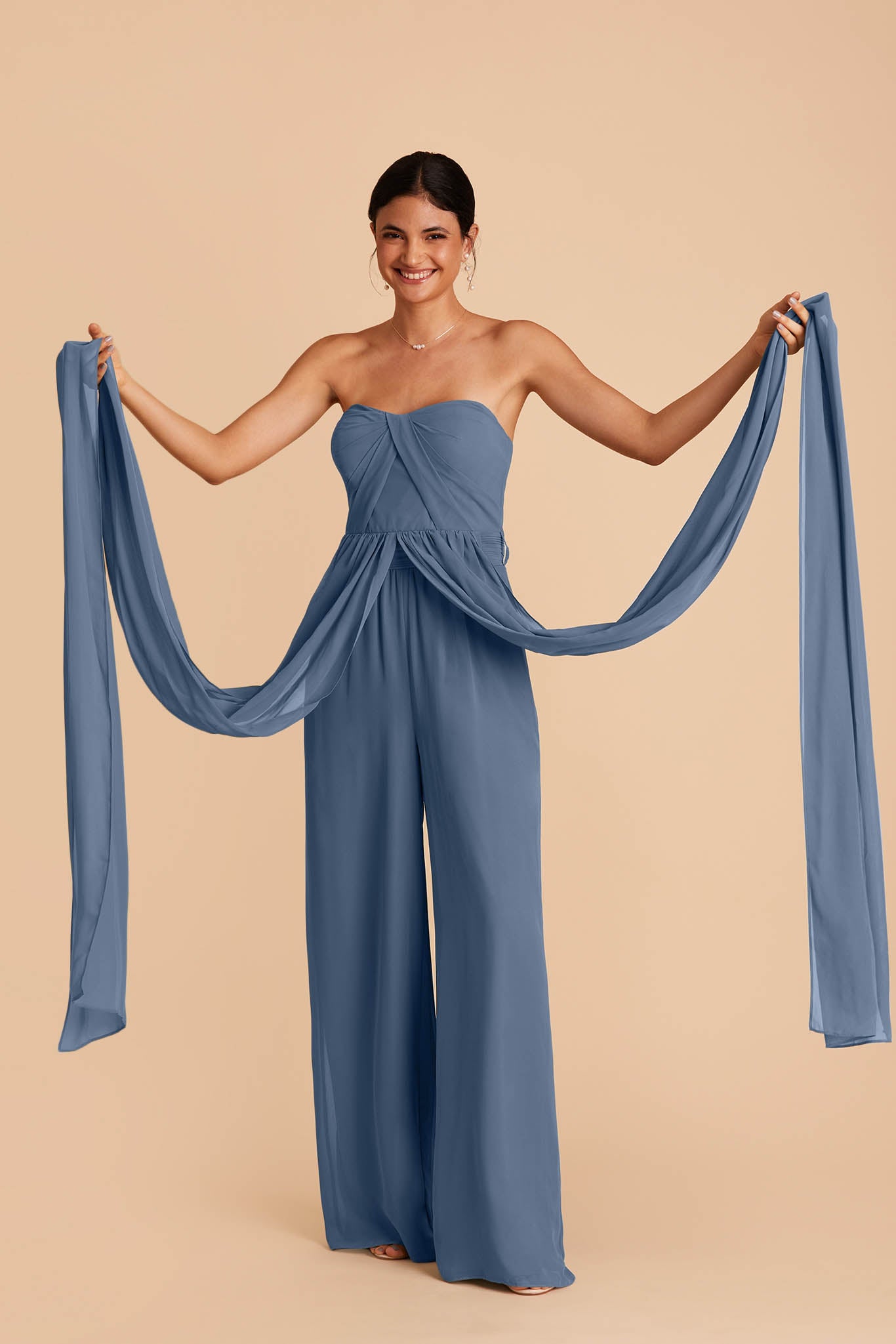 Medium blue wedding jumpsuit with sweetheart bodice with convertible neckline untied